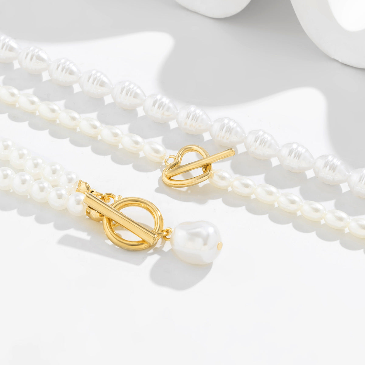 Conjunto de Pulseras Infinity con Perlas