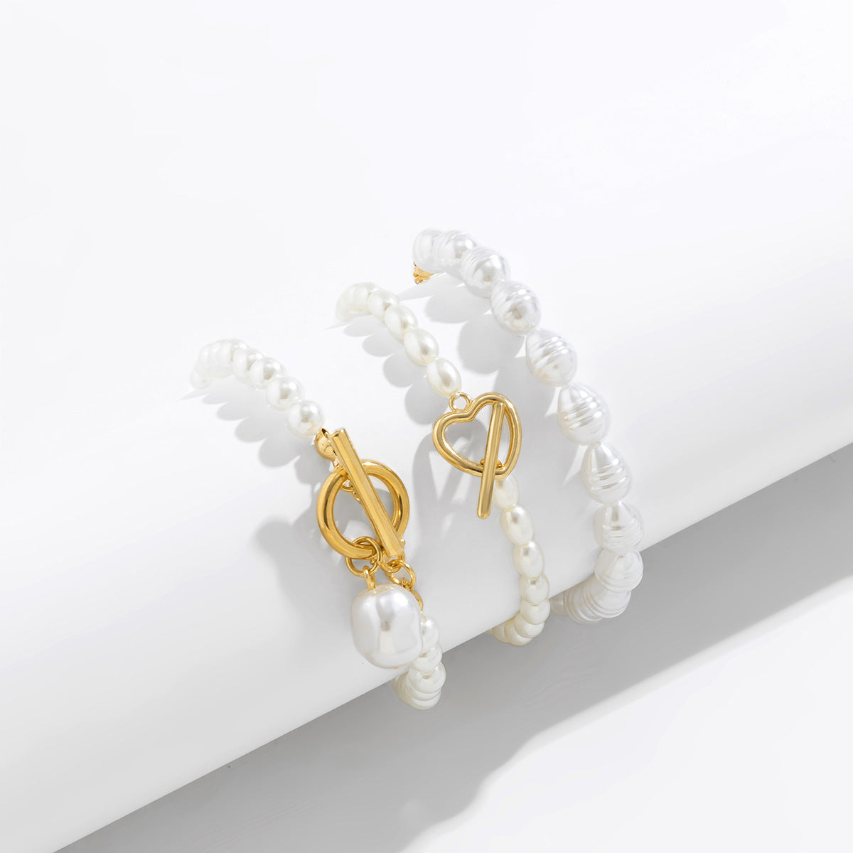 Conjunto de Pulseras Infinity con Perlas