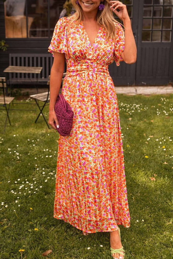 Vestido elegante con escote en v - Raúl & Sara Madrid