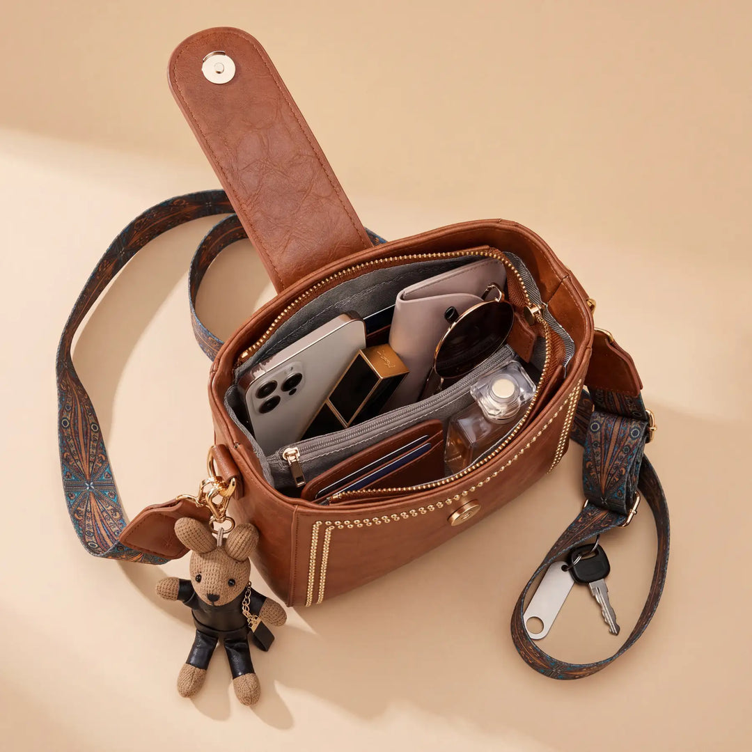 Bolso tipo Satchel + Muñeco Arion de regalo