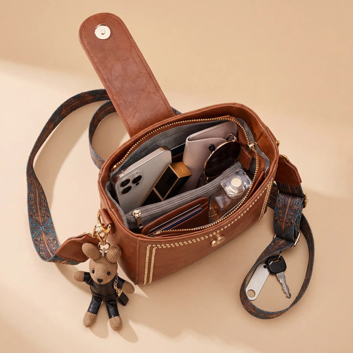 Bolso tipo Satchel + Muñeco Arion de regalo