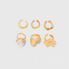 Anillo Abierto de Perla con Diseño de Flor Líquida - Raúl & Sara Madrid
