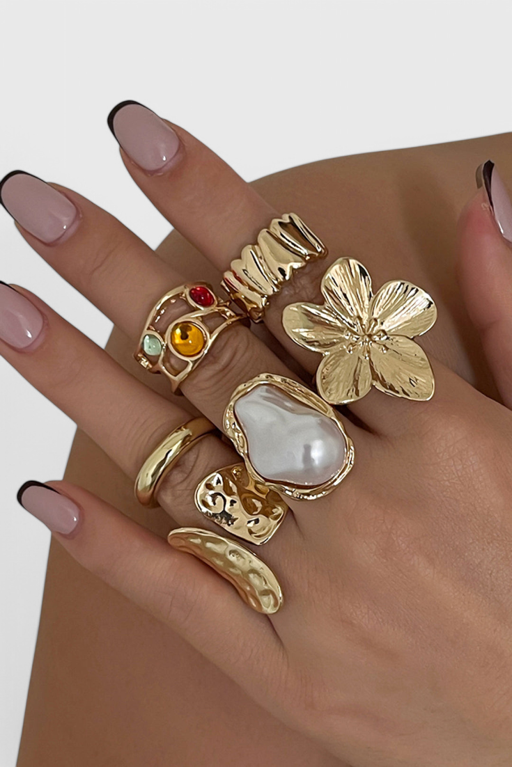 Anillo Abierto de Perla con Diseño de Flor Líquida - Raúl & Sara Madrid