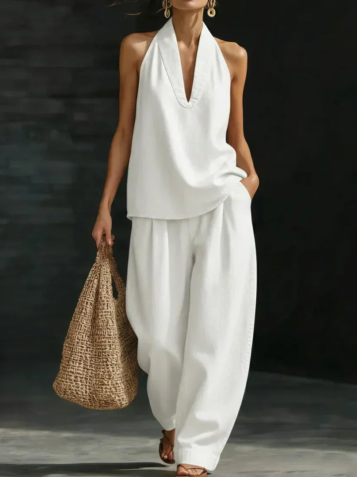 Marina™ | Mono Largo Fluido con Escote en V" can be rewritten as:

"Marina™ | Mono Largo Elegante con Escote en V