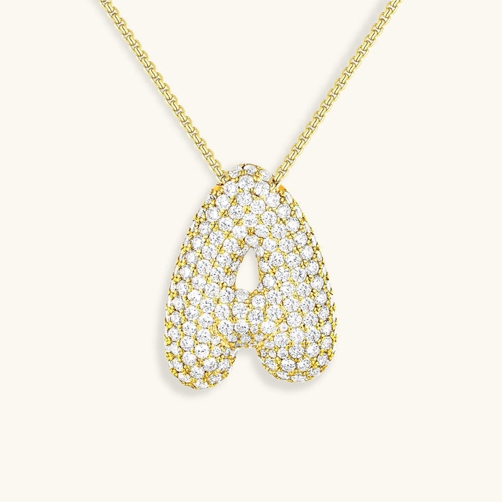 Melanie – Doble corazón en collar dorado
