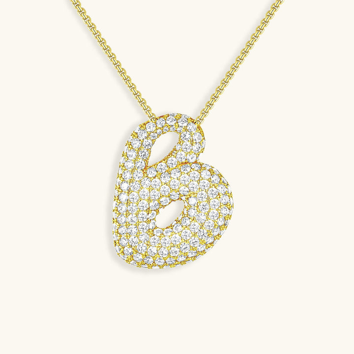 Melanie – Doble corazón en collar dorado