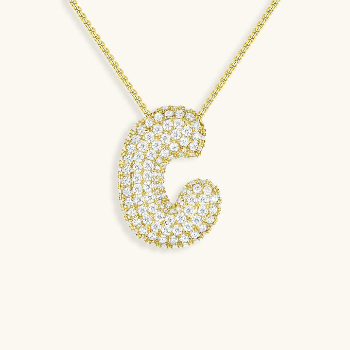 Melanie – Doble corazón en collar dorado