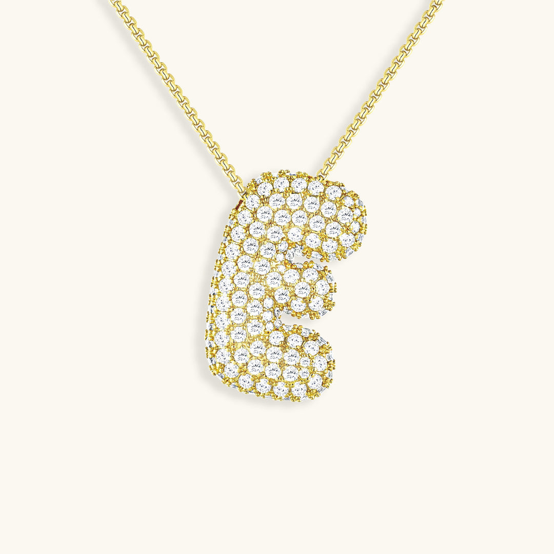 Melanie – Doble corazón en collar dorado