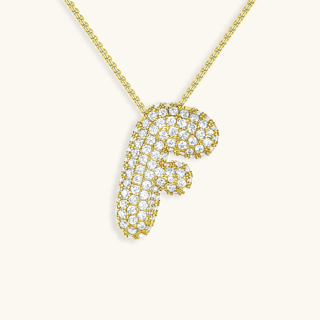 Melanie – Doble corazón en collar dorado