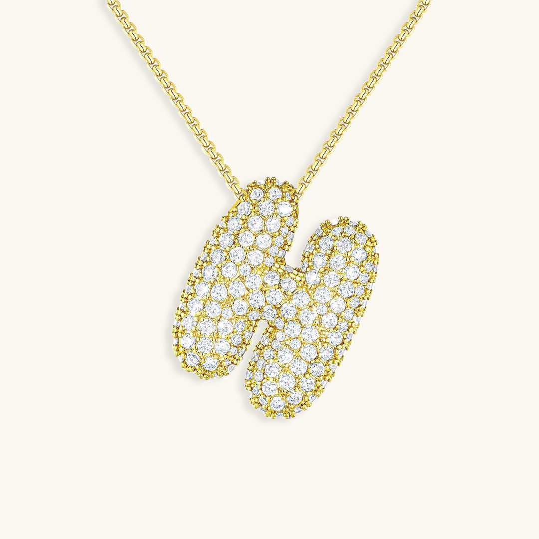 Melanie – Doble corazón en collar dorado