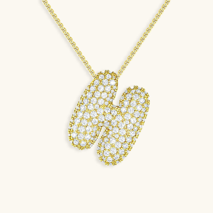 Melanie – Doble corazón en collar dorado