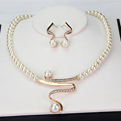 Conjunto de collar y aretes con perlas naturales - Raúl & Sara Madrid
