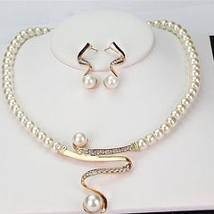 Conjunto de collar y aretes con perlas naturales - Raúl & Sara Madrid