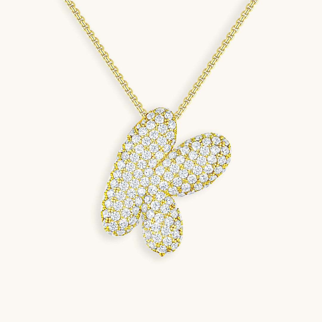 Melanie – Doble corazón en collar dorado