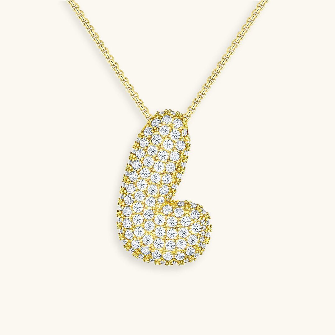 Melanie – Doble corazón en collar dorado