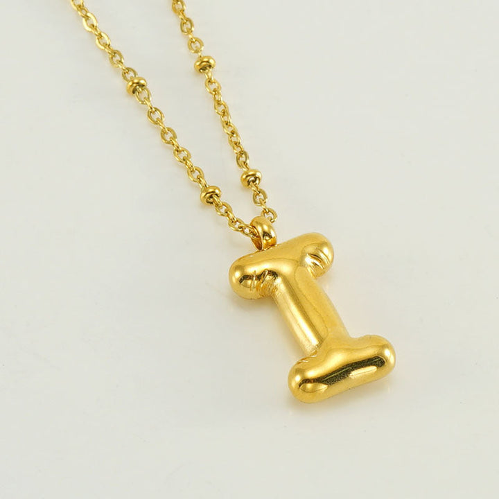 Irena – Collar dorado con charm de inicial