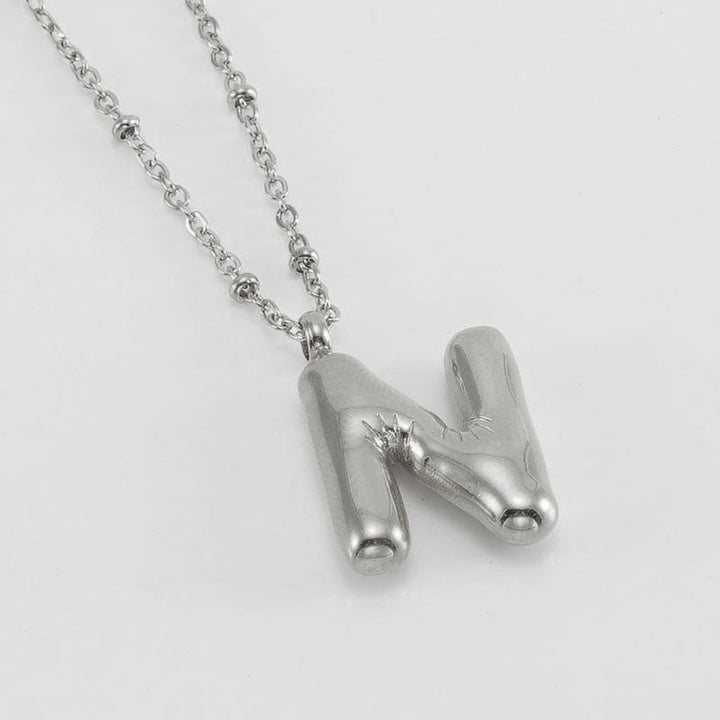 Irena – Collar dorado con charm de inicial