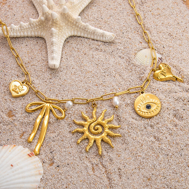 Emilie – Delicate Gold Collar with Tiny Charms