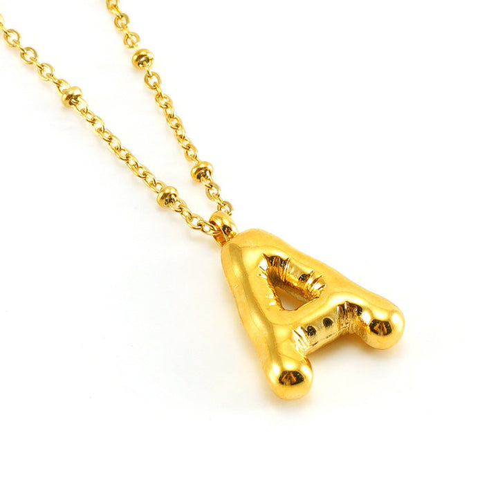 Irena – Collar dorado con charm de inicial