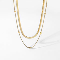 Collar doble capa dorado con brillo moderno - Raúl & Sara Madrid