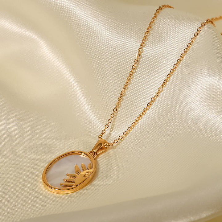 Elisabeth – Collar dorado con encantos simbólicos