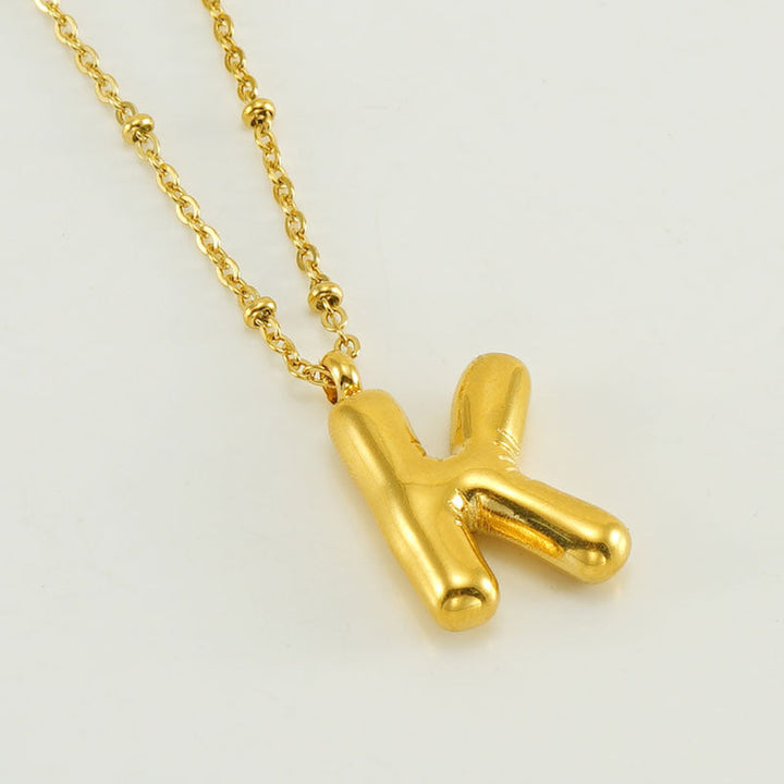Irena – Collar dorado con charm de inicial