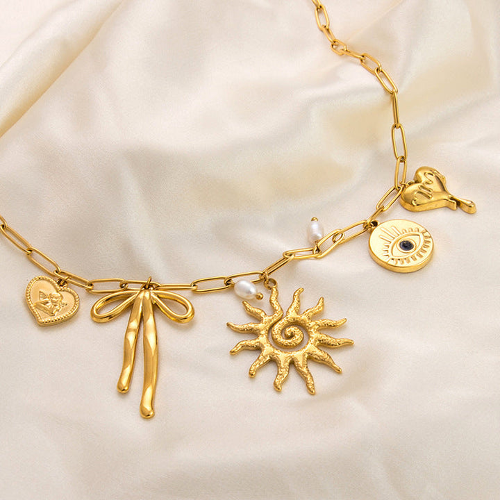Emilie – Delicate Gold Collar with Tiny Charms