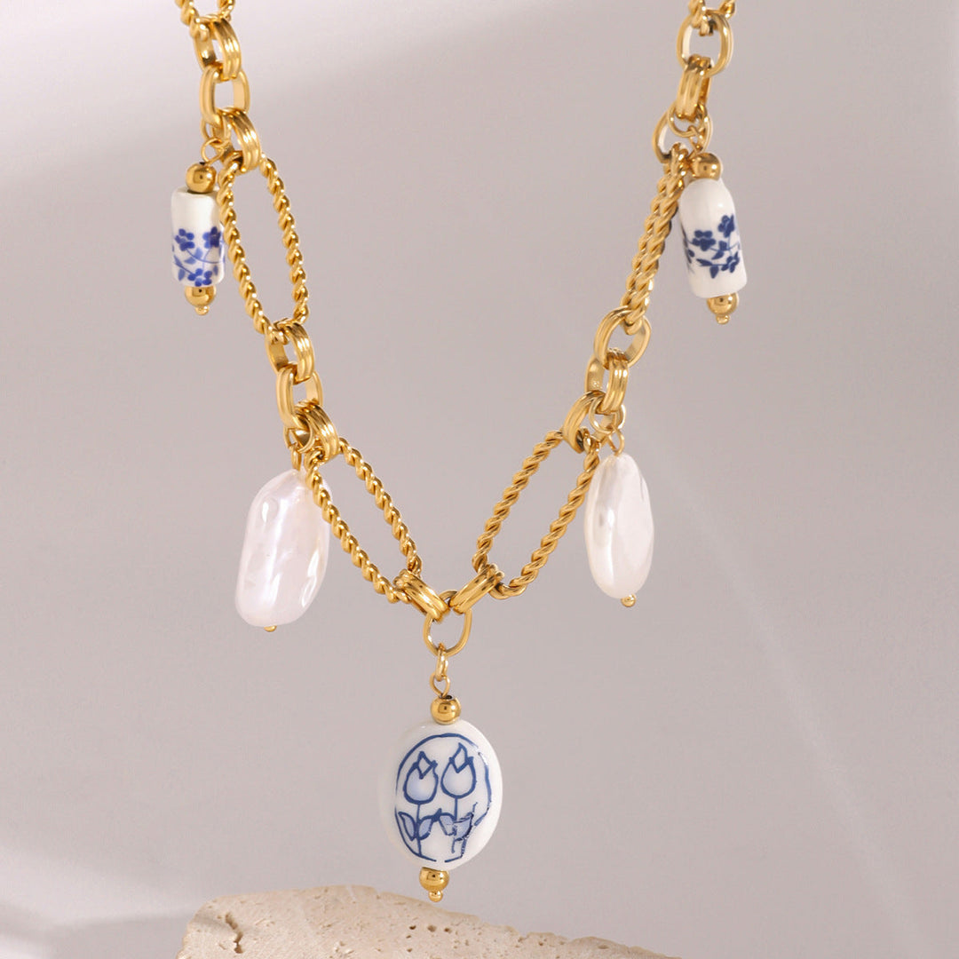 Lena - Collar de oro con adornos de piedra.