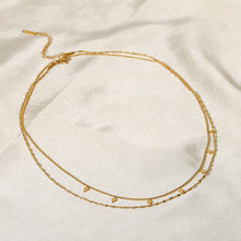 Collar dorado elegante con diseño geométrico - Raúl & Sara Madrid