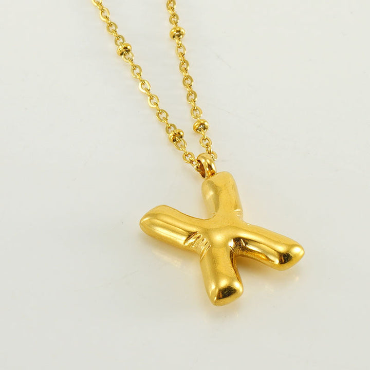 Irena – Collar dorado con charm de inicial
