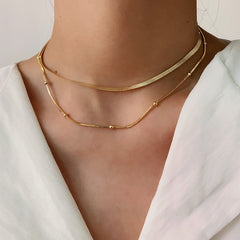 Collar doble capa dorado con brillo moderno - Raúl & Sara Madrid