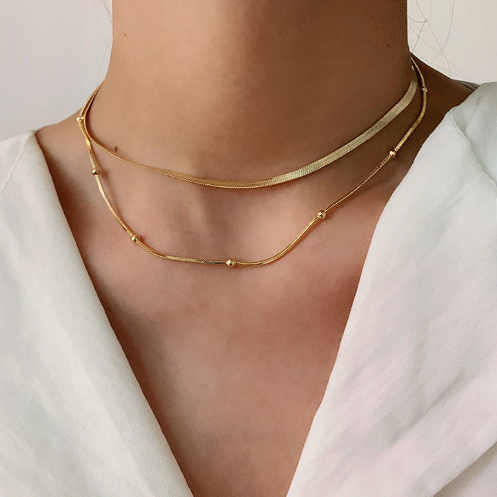 Klara – Collar Doble Capa Dorado con Brillo Moderno