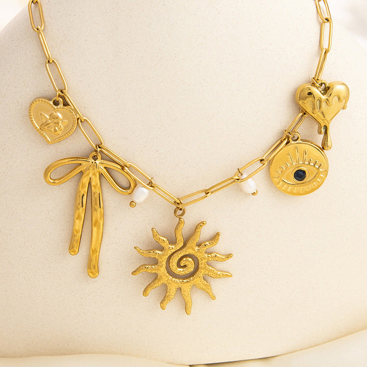 Emilie – Delicate Gold Collar with Tiny Charms