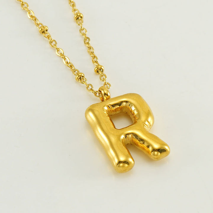 Irena – Collar dorado con charm de inicial