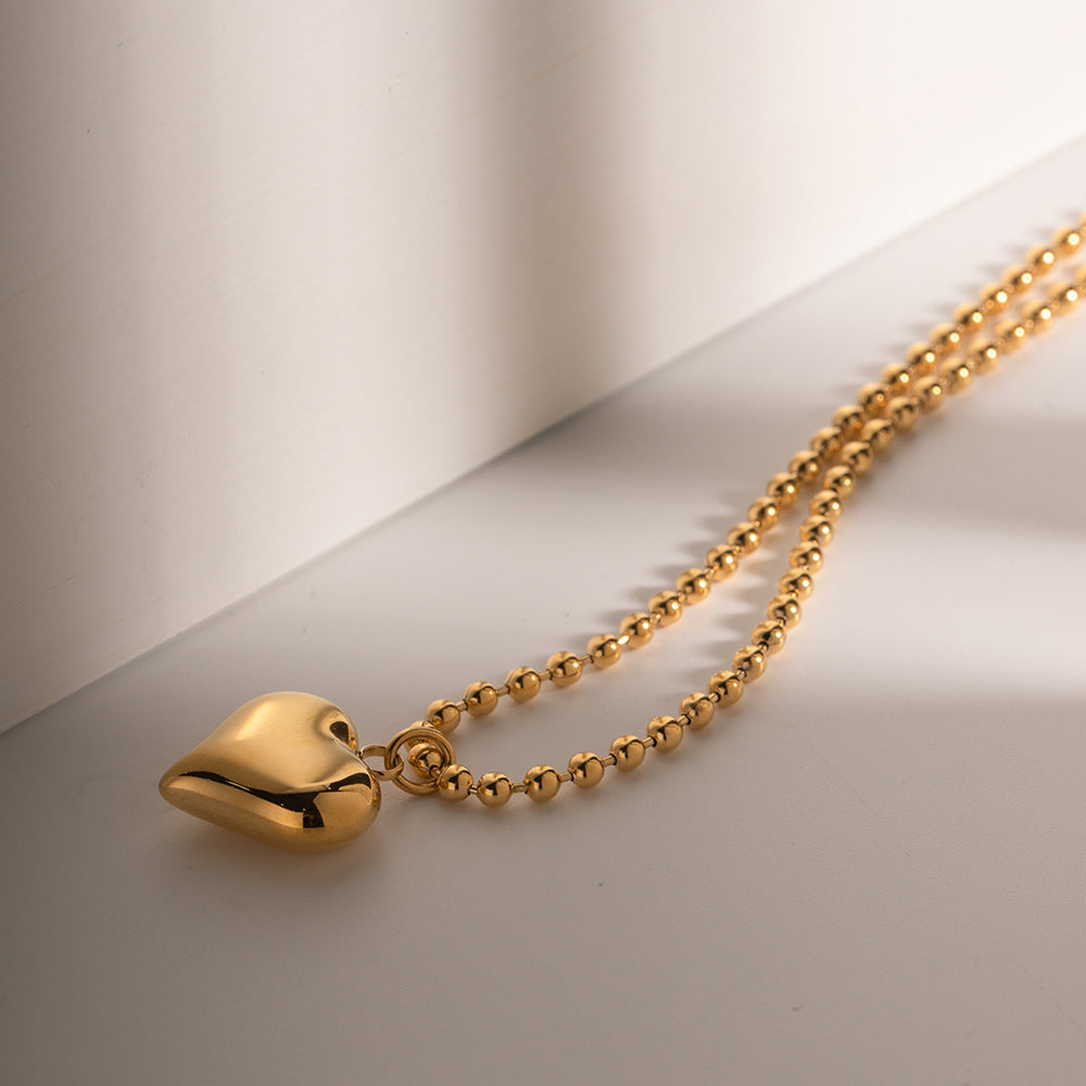 Collar dorado con colgante moderno - Raúl & Sara Madrid