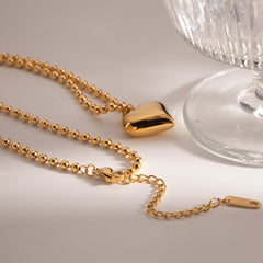 Collar dorado con colgante moderno - Raúl & Sara Madrid