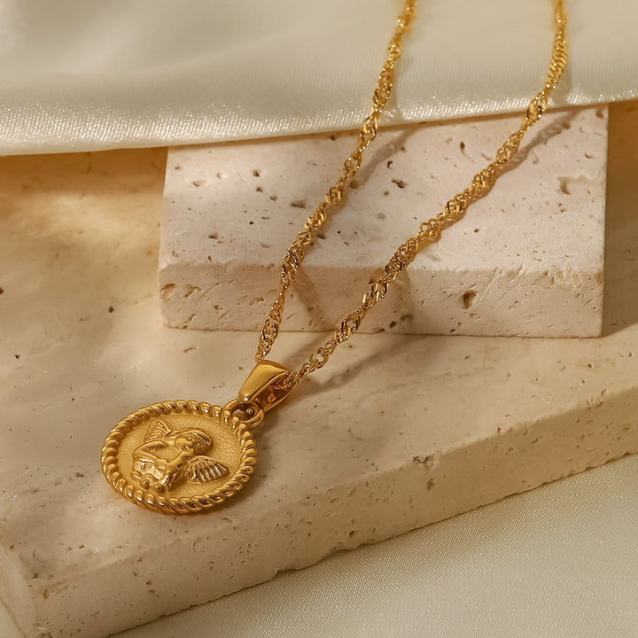 Elisabeth – Collar dorado con encantos simbólicos