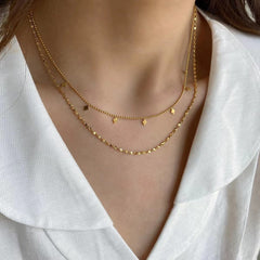 Collar dorado elegante con diseño geométrico - Raúl & Sara Madrid