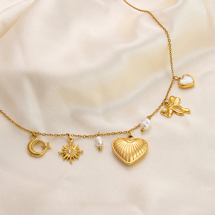 Emilie – Delicate Gold Collar with Tiny Charms