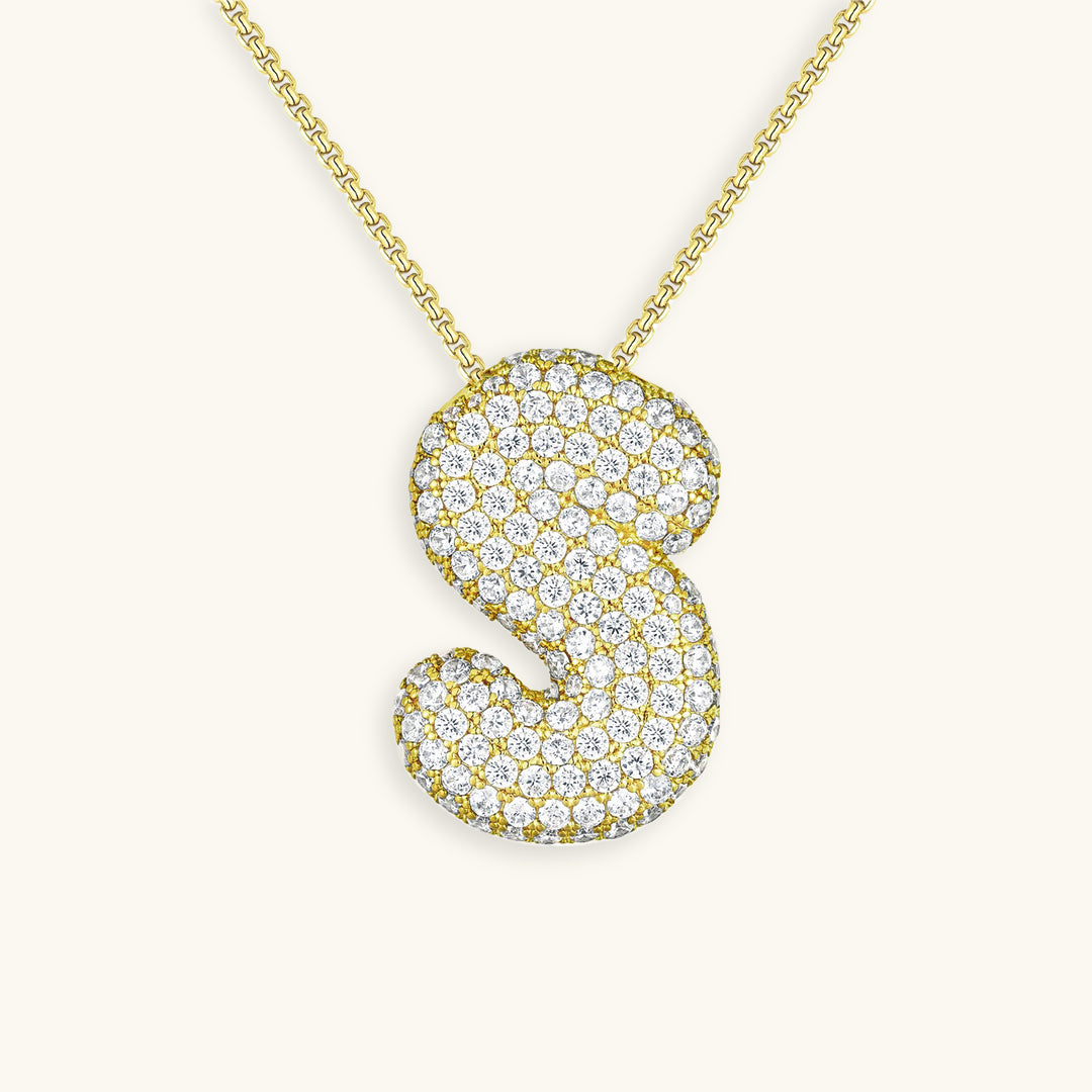 Melanie – Doble corazón en collar dorado