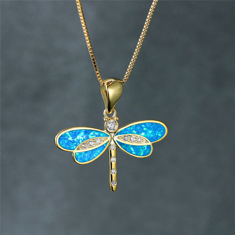 Collar dorado en forma de mariposa con ópalo - Raúl & Sara Madrid