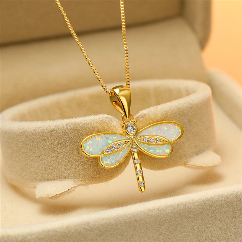 Collar dorado en forma de mariposa con ópalo - Raúl & Sara Madrid