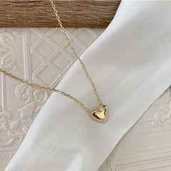 Collar dorado con colgante circular - Raúl & Sara Madrid