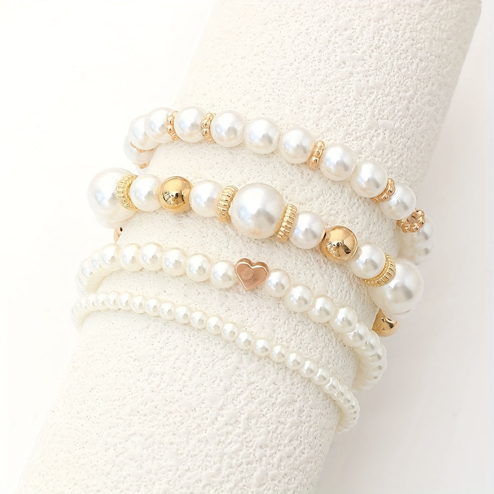 Juego de sofisticadas pulseras en forma de corazón con perlas