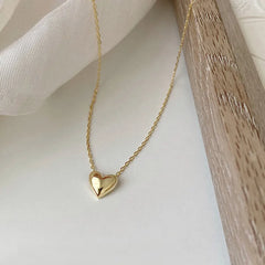 Collar dorado con colgante circular - Raúl & Sara Madrid