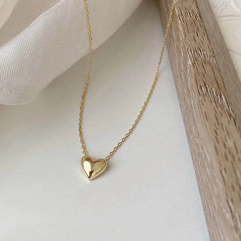 Collar dorado con colgante circular - Raúl & Sara Madrid