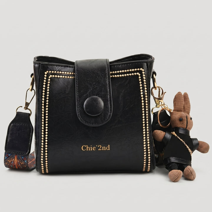 Bolso tipo Satchel + Muñeco Arion de regalo