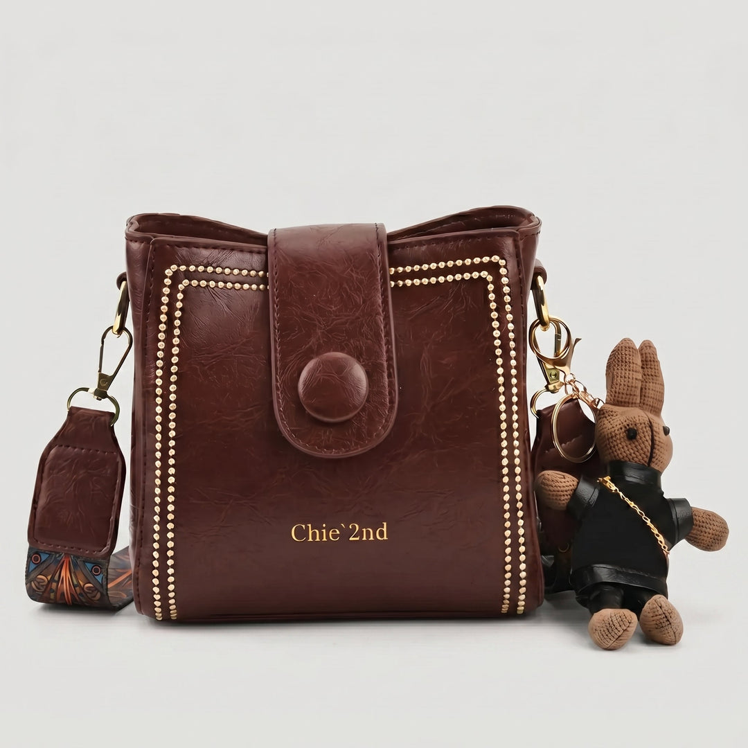 Bolso tipo Satchel + Muñeco Arion de regalo