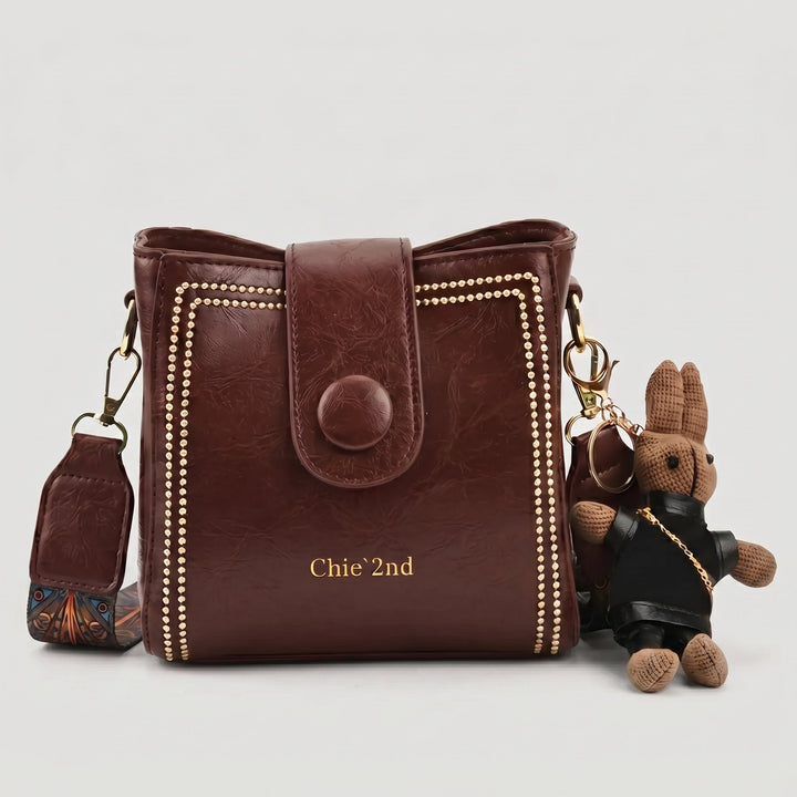 Bolso tipo Satchel + Muñeco Arion de regalo