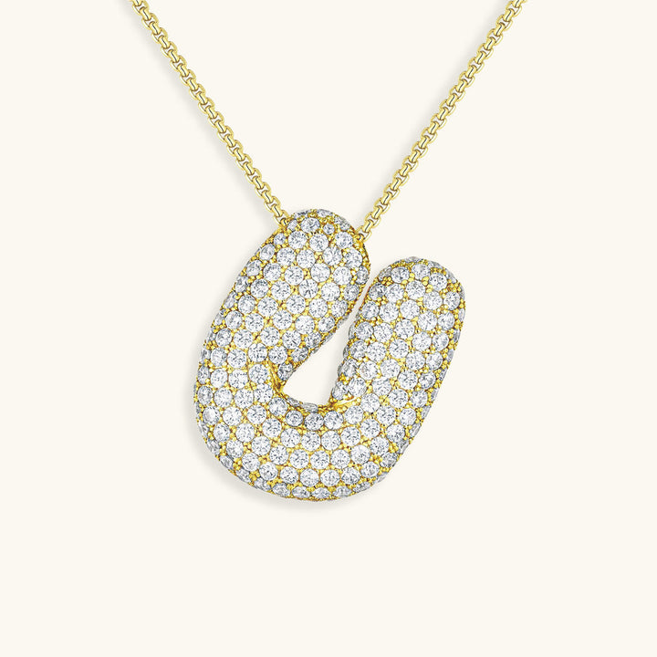 Melanie – Doble corazón en collar dorado